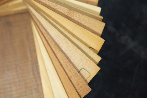 various wood samples displayed on a table